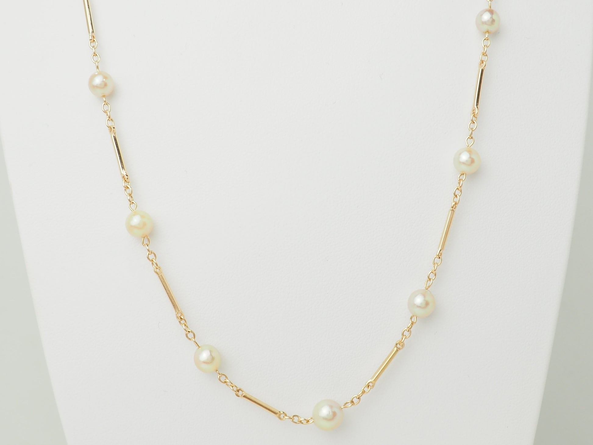 Collier en or jaune à perles – Boules alternées par des barres