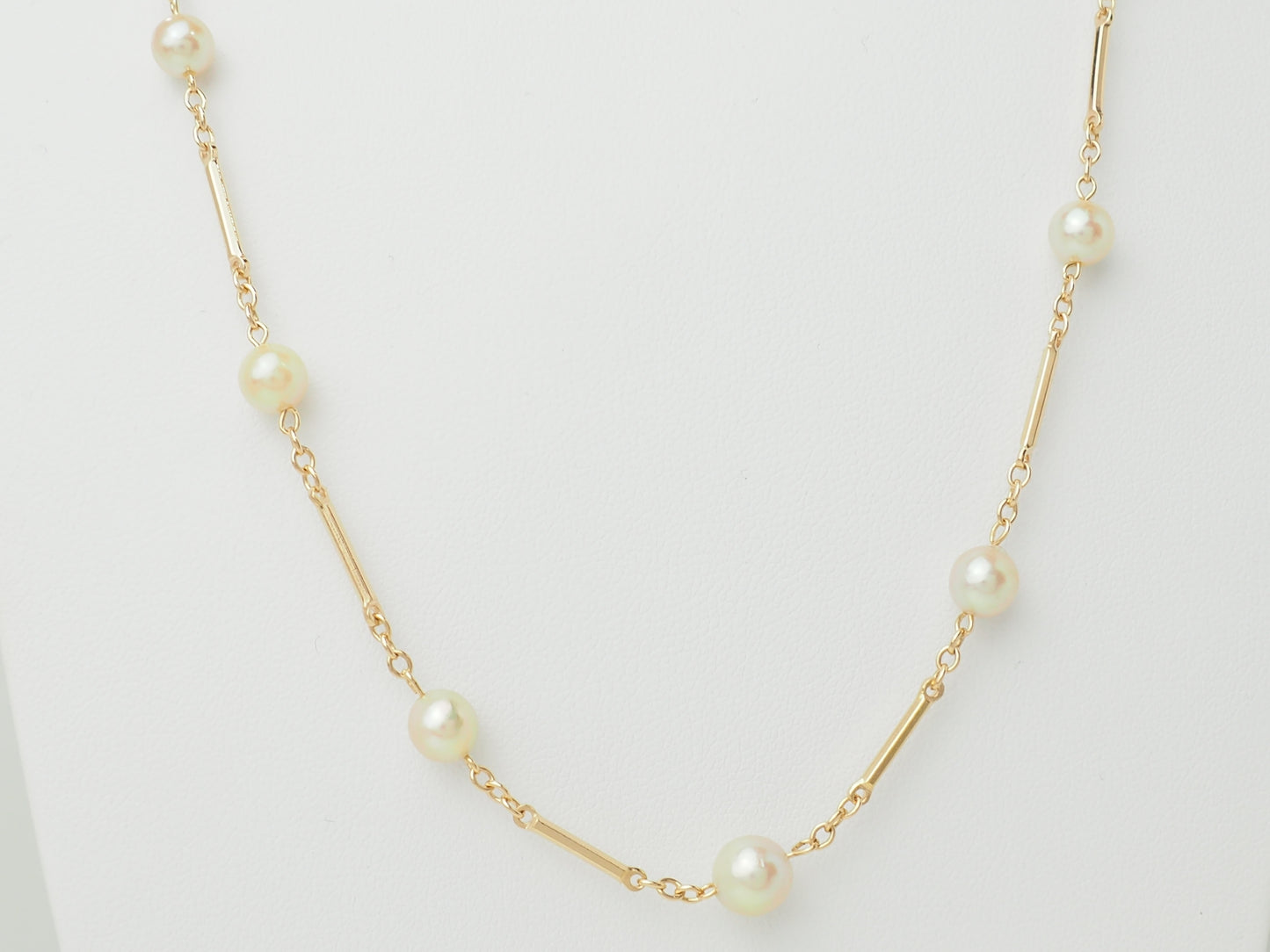 Collier en or jaune à perles – Boules alternées par des barres