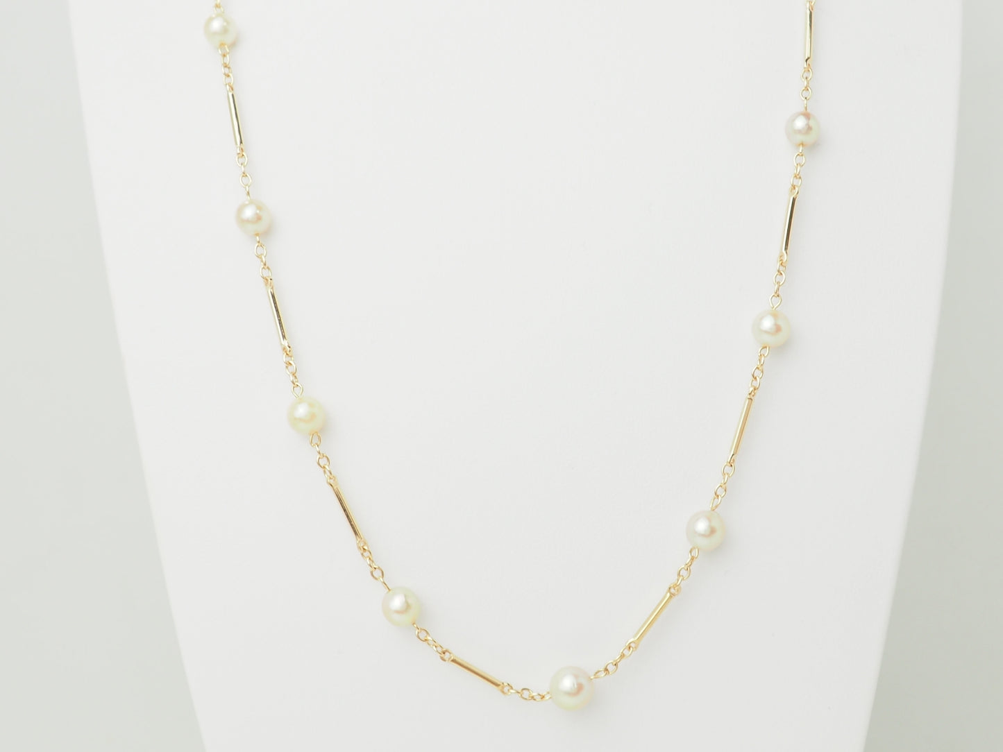 Collier en or jaune à perles – Boules alternées par des barres