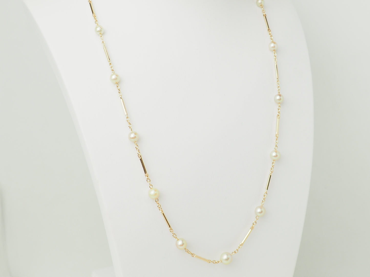 Collier en or jaune à perles – Boules alternées par des barres