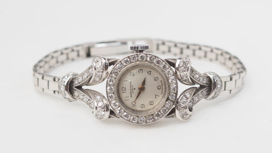 Montre Baume & Mercier en or blanc et diamants