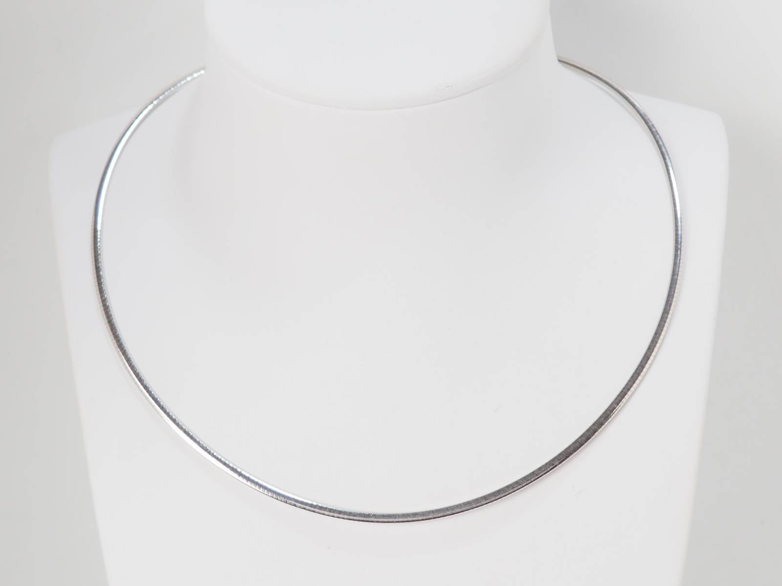 Collier Oméga d'occasion en or jaune