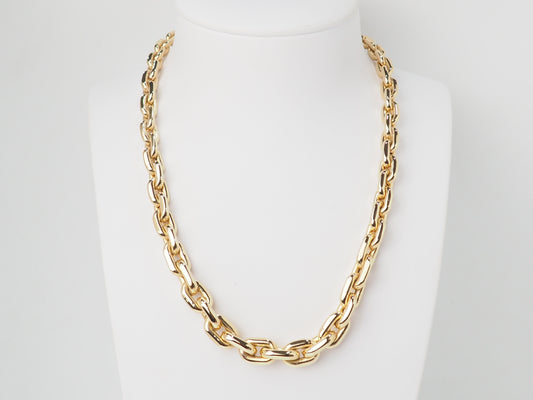 Collier maille forcat limée en chute en or jaune et diamant