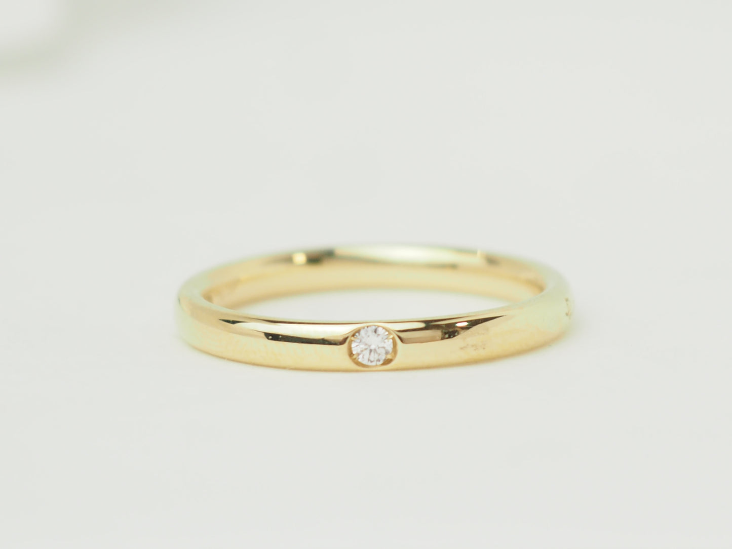 Détail diamant bague Lucciole en or jaune
