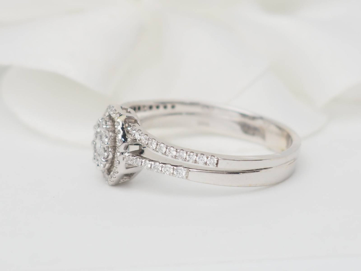 Bague solitaire en or blanc et diamants 0.66ct