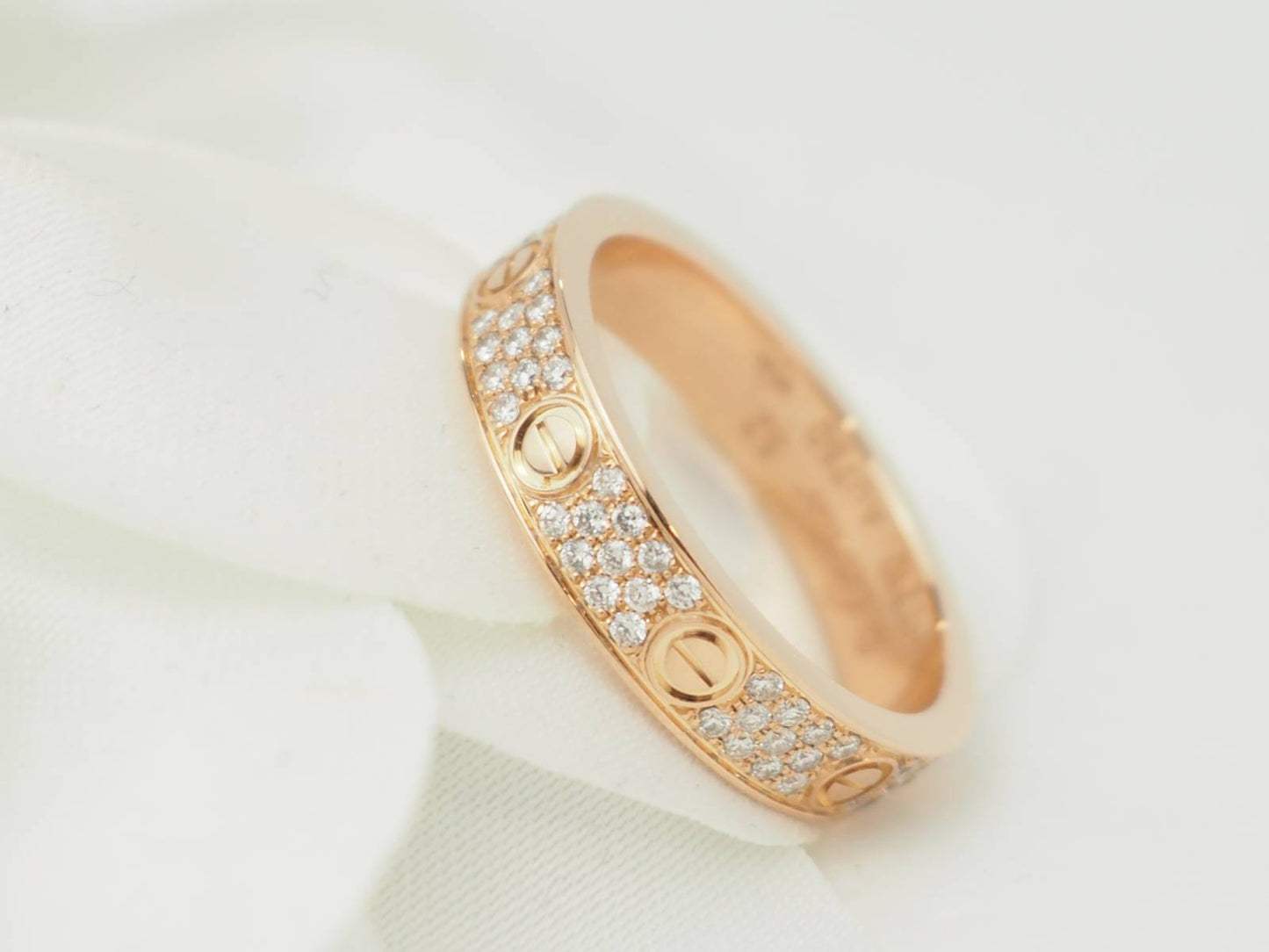 Bague Love Cartier en or jaune et diamants d'occasion