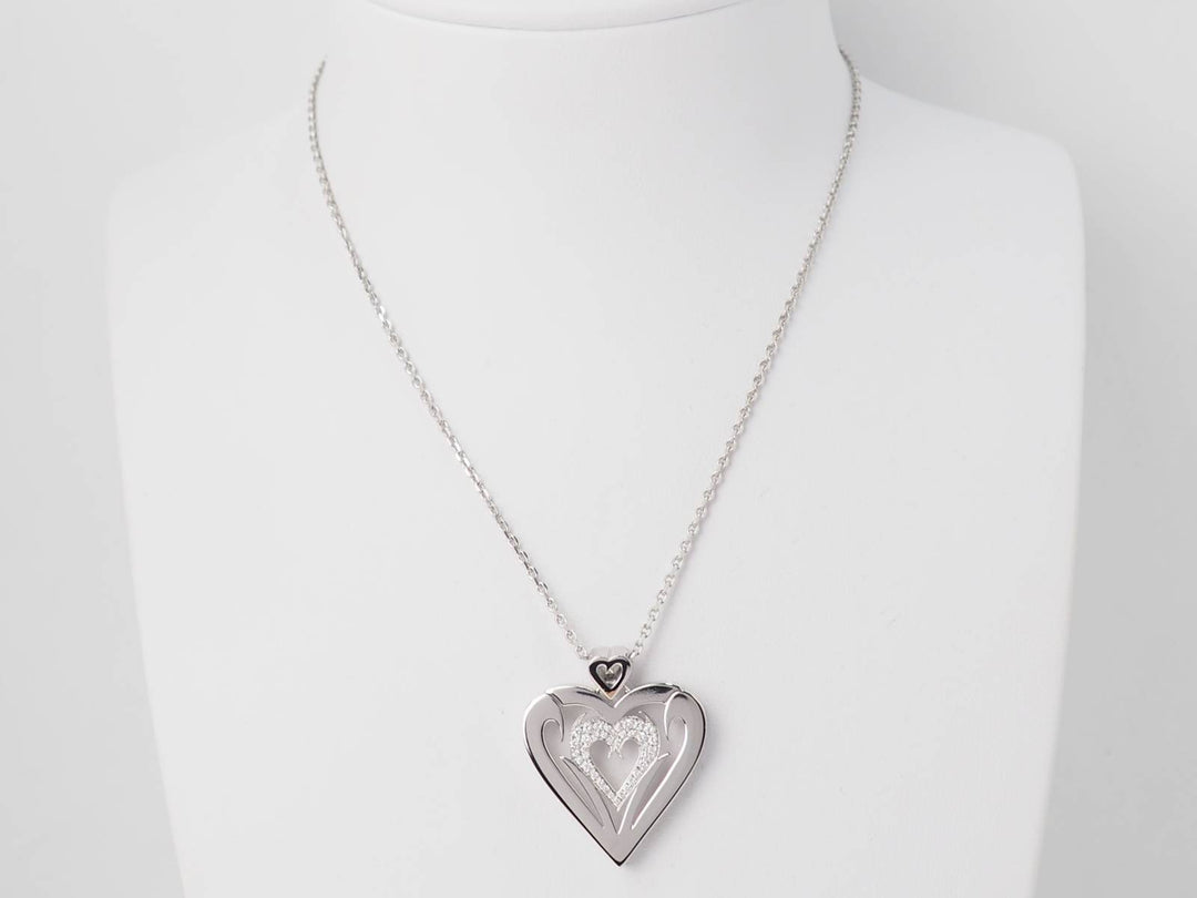 Collier coeur en or blanc et diamants en vente à Marseille