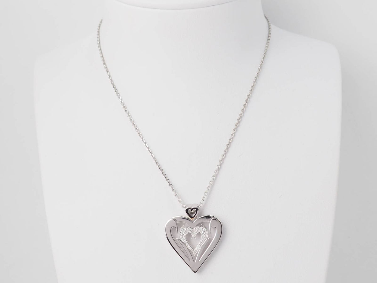 Collier coeur en or blanc et diamants en vente à Marseille
