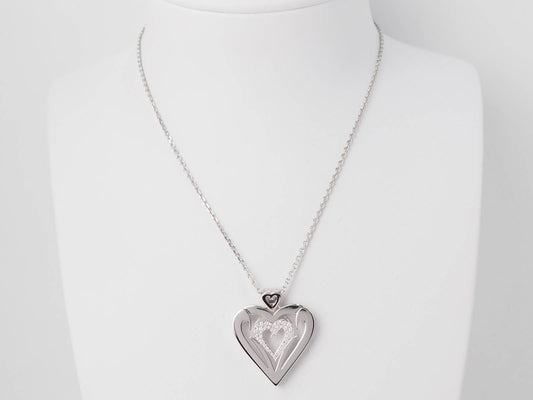 Collier coeur en or blanc et diamants en vente à Marseille