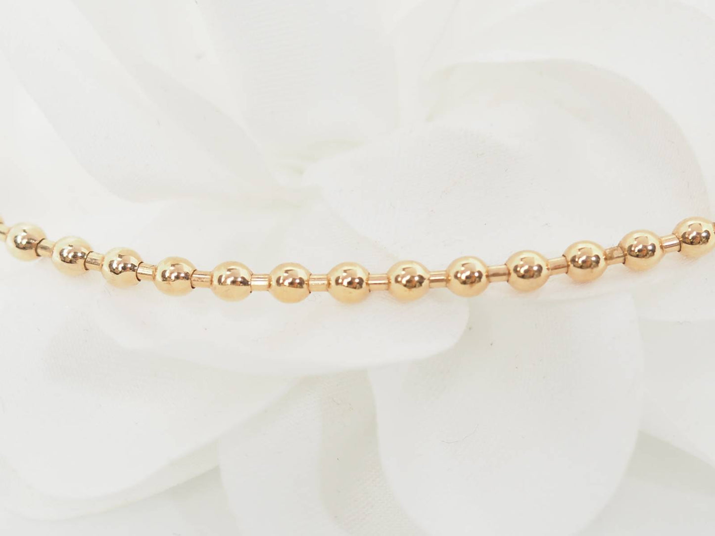 Collier boules rigide et trèfles en or rose et diamants