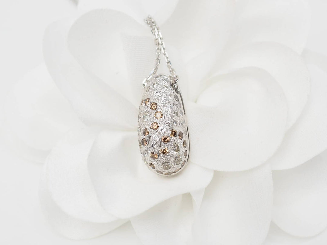 Collier pendentif dôme en or blanc et diamants