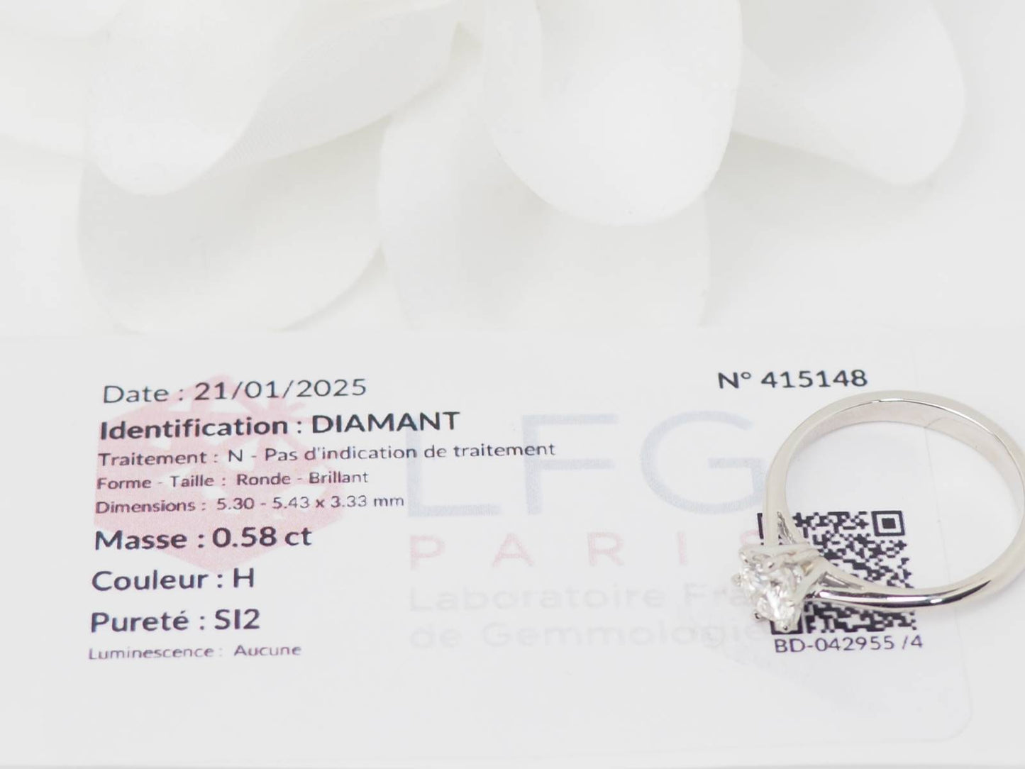 Bague solitaire en or blanc et diamant 0.58ct