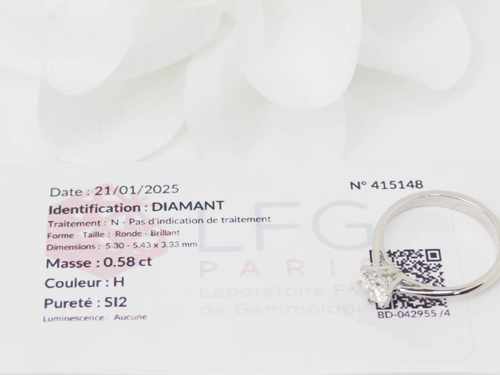 Bague solitaire en or blanc et diamant 0.58ct