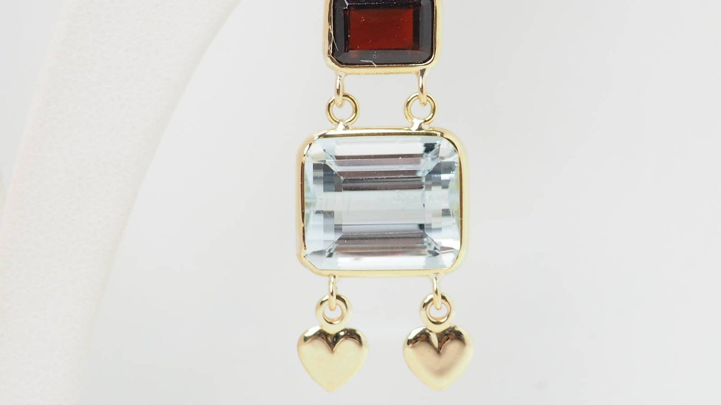 Boucles d'oreilles en or jaune, aigue marine et grenat