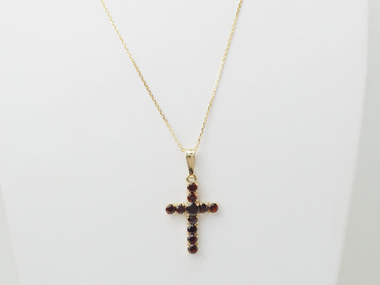 Collier pendentif croix en or jaune et grenats