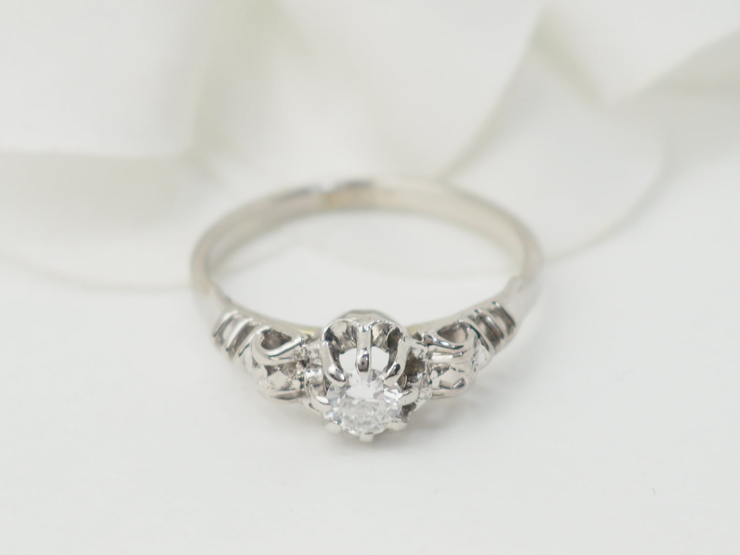 Bague solitaire en or blanc et platine, diamant 0,23ct