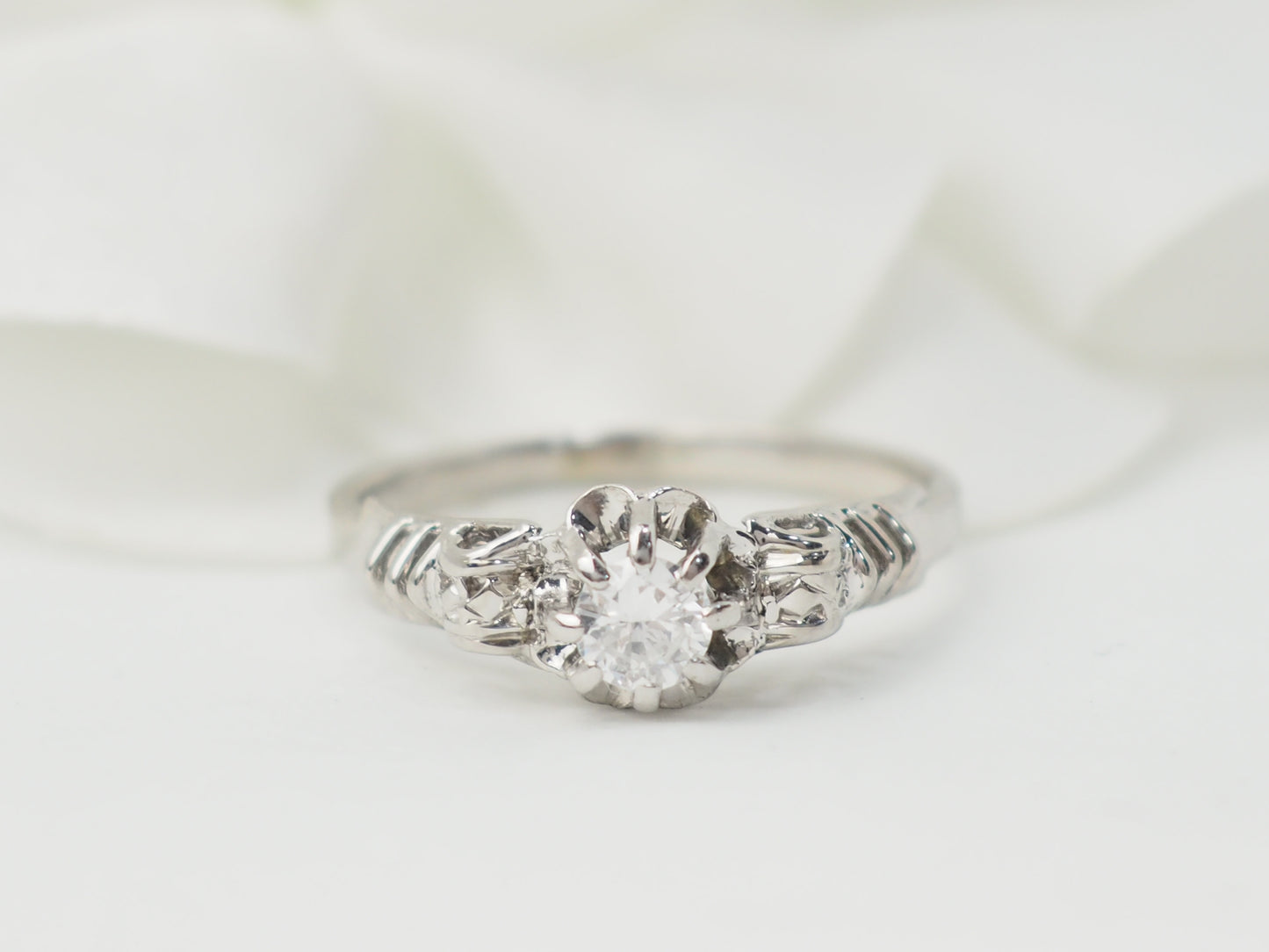 Bague solitaire en or blanc et platine, diamant 0,23ct