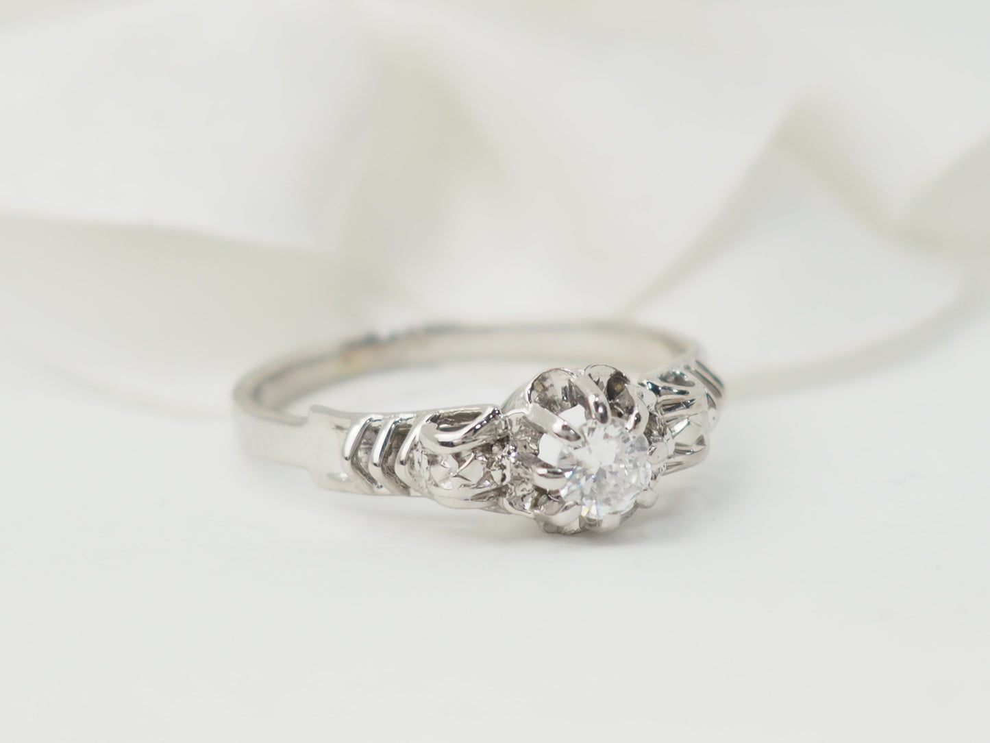 Bague solitaire en or blanc et platine, diamant 0,23ct