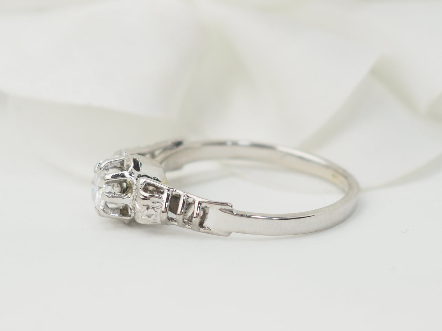 Bague solitaire en or blanc et platine, diamant 0,23ct