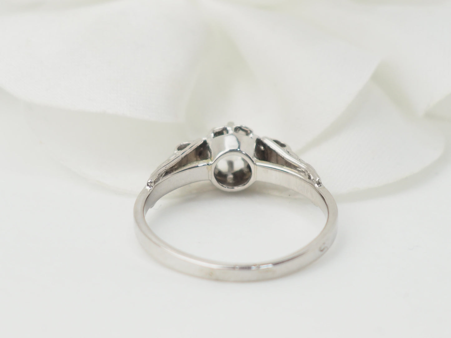 Bague solitaire en or blanc et platine, diamant 0,23ct