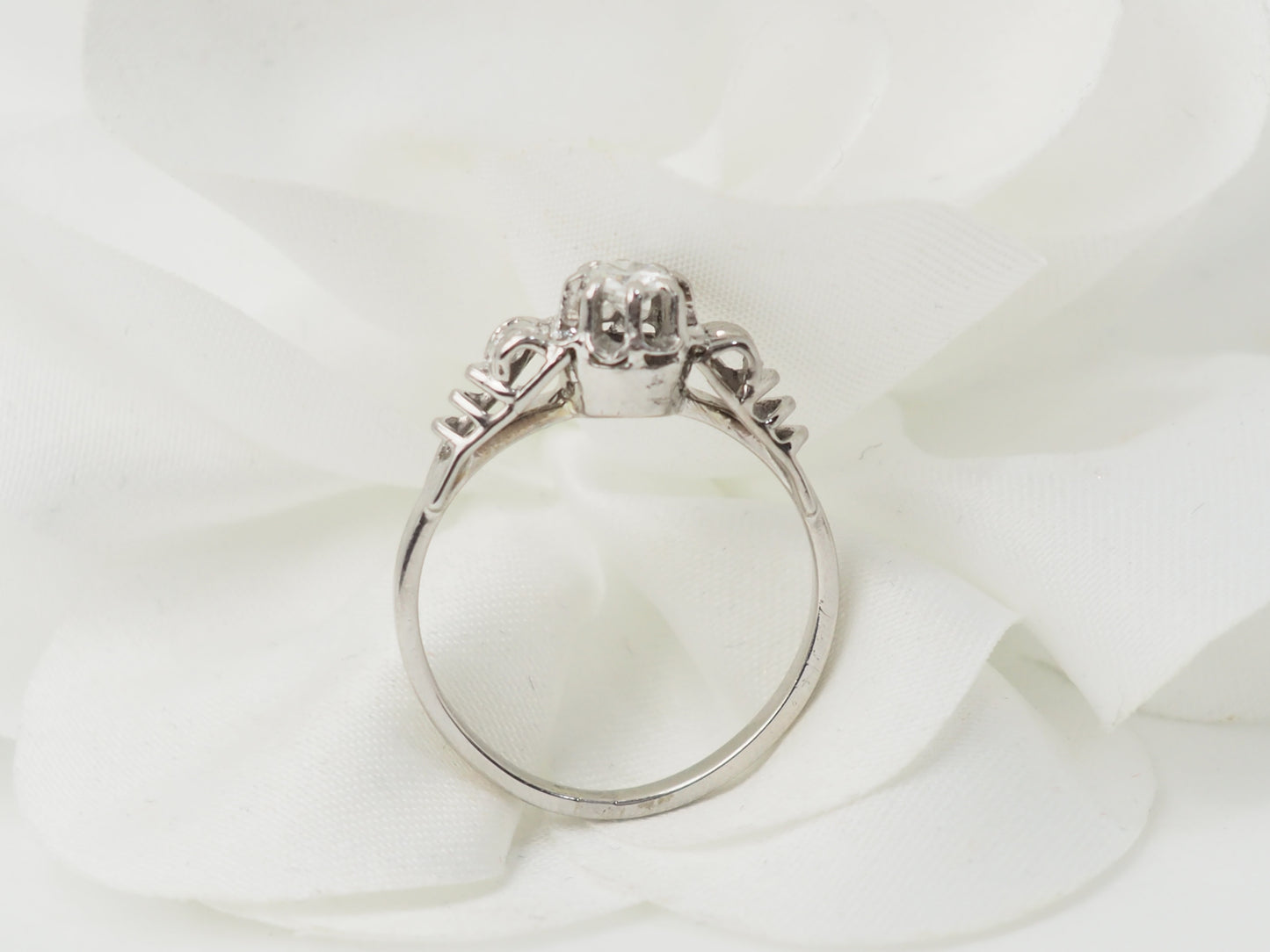 Bague solitaire en or blanc et platine, diamant 0,23ct