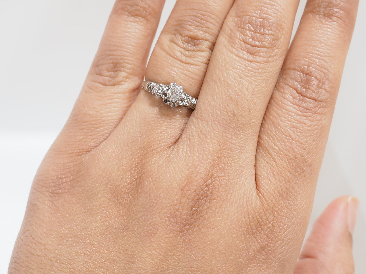 Bague solitaire en or blanc et platine, diamant 0,23ct