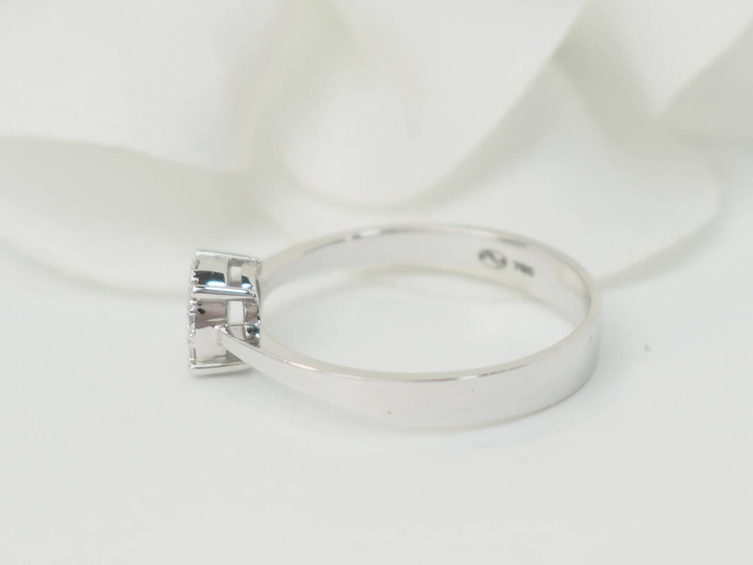 Bague solitaire en or blanc et diamants 0.16ct