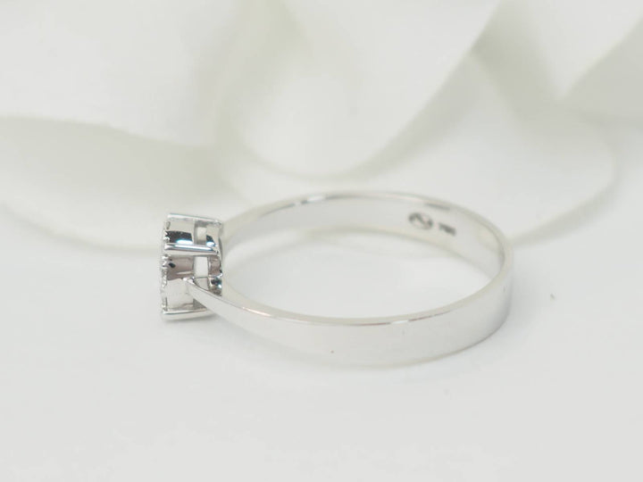 Bague solitaire en or blanc et diamants 0.16ct