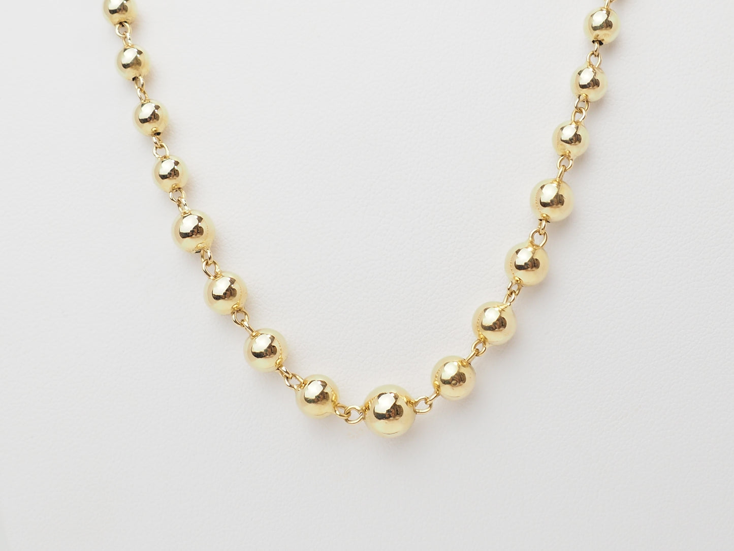 Collier marseillais en or jaune 18 carats à boules dégradées