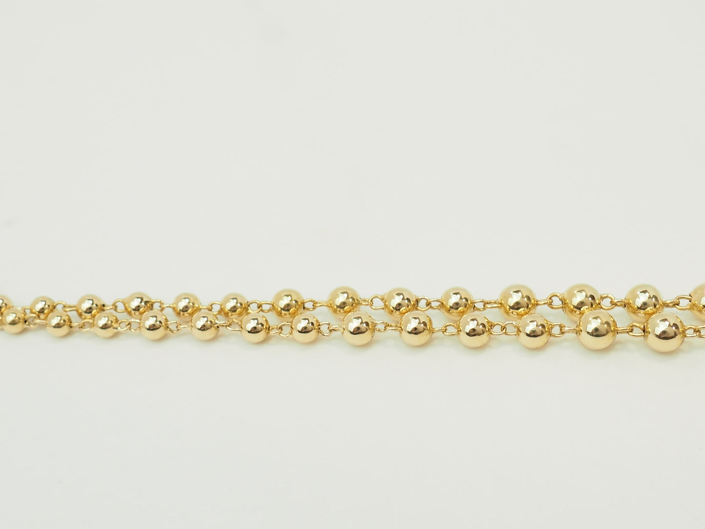 Collier marseillais en or jaune 18 carats à boules dégradées