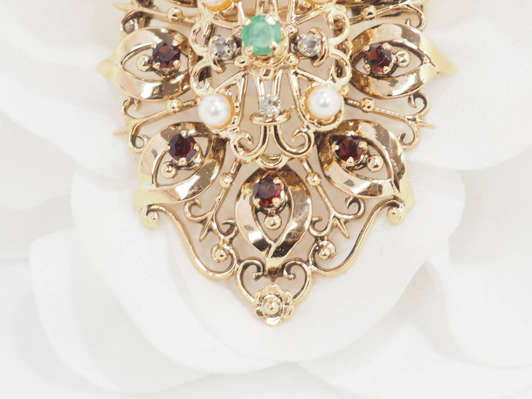Broche pendentif en or jaune, emeraude et perles de culture