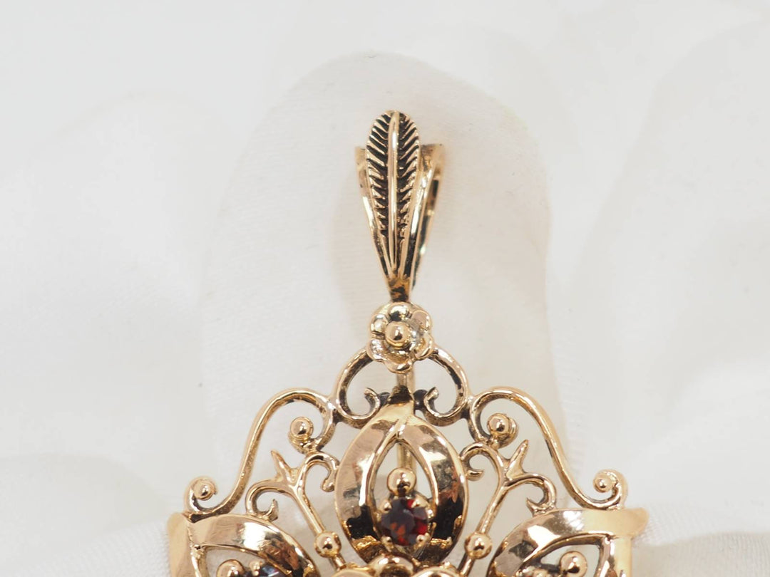 Broche pendentif en or jaune, emeraude et perles de culture