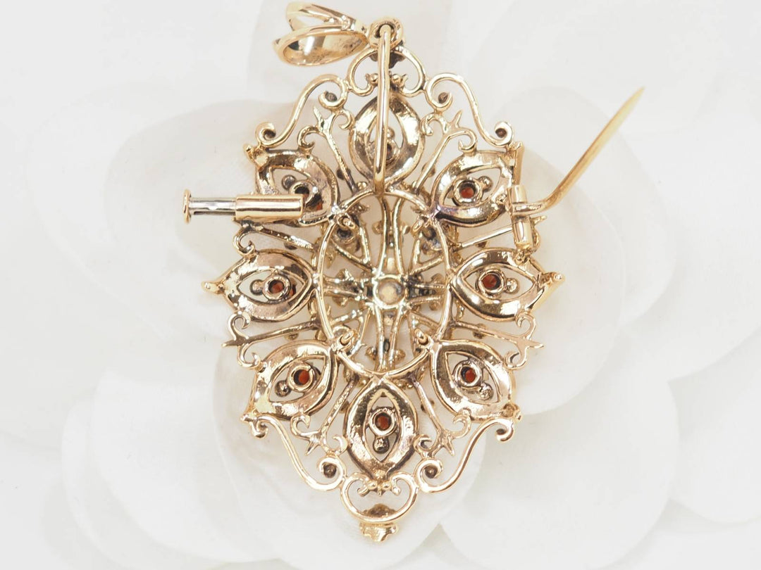 Broche pendentif en or jaune, emeraude et perles de culture