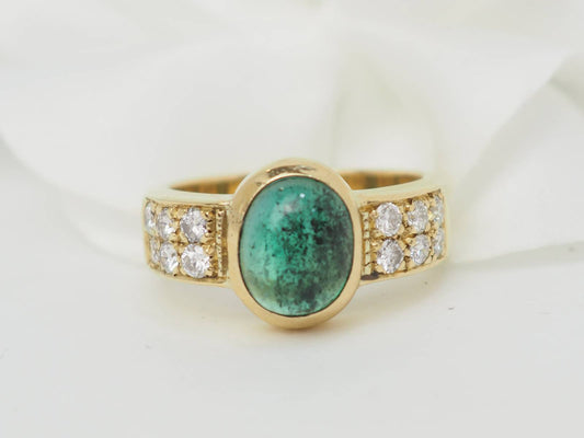 Bague en or jaune et émeraude