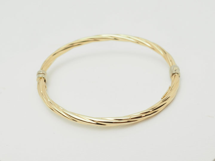 Bracelet ouvrant enfant en or jaune – Jonc torsadé
