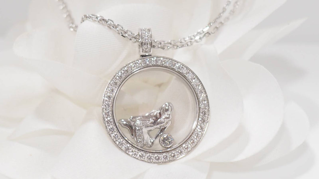 Collier Chopard "happy Diamonds" en or blanc et diamants
