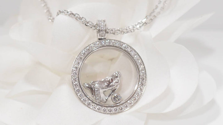 Collier Chopard "happy Diamonds" en or blanc et diamants