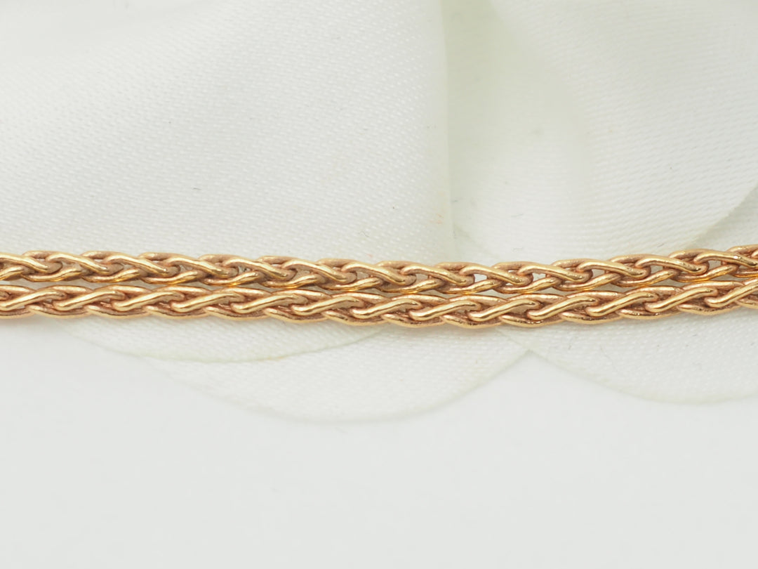 Collier pendentif fleur en or rose, pierres fines et diamants