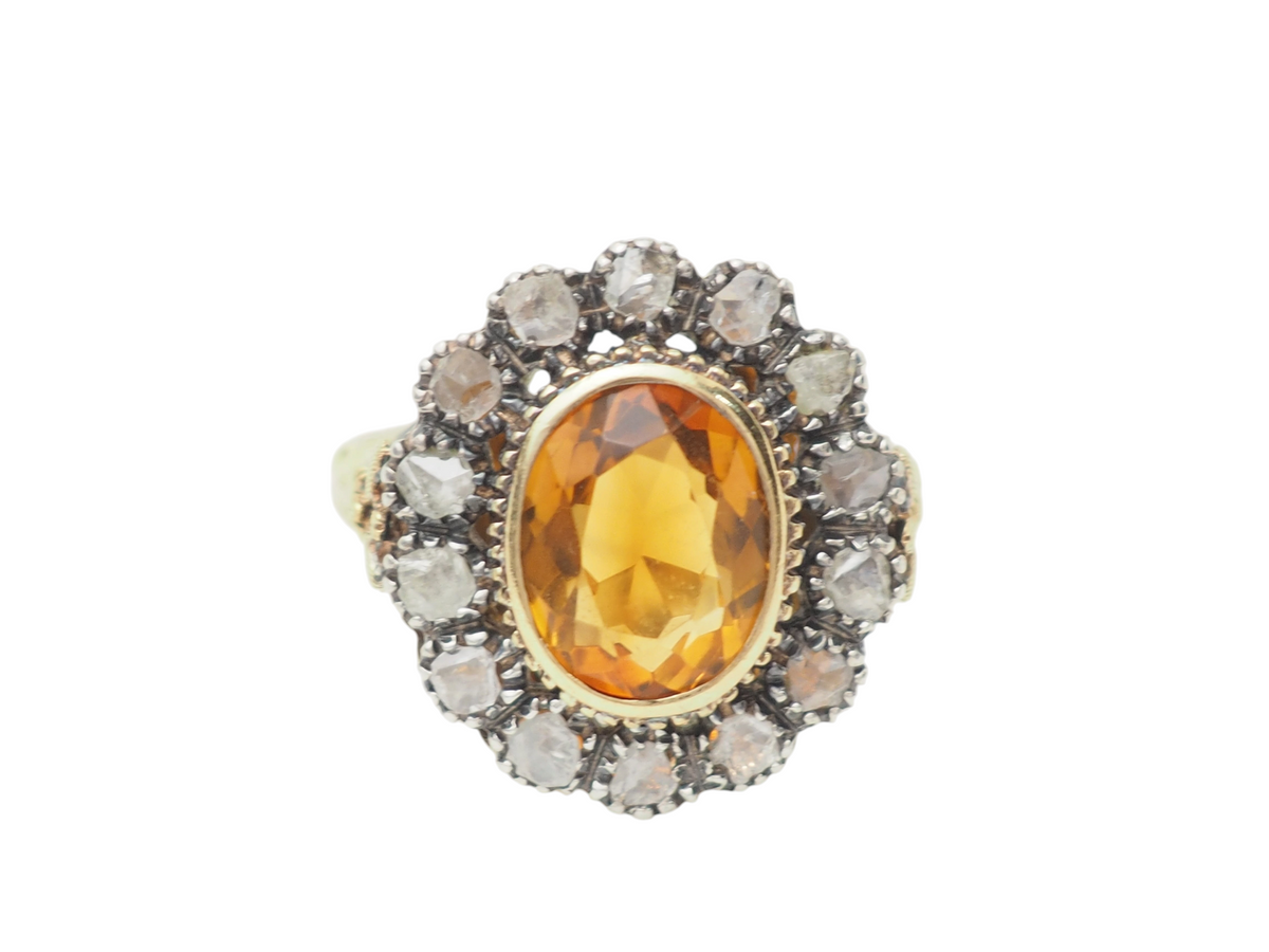 Bague ancienne L'Aurore en or jaune 18k, ornée d'une topaze ovale entourée de diamants taille rose, style Napoléon III