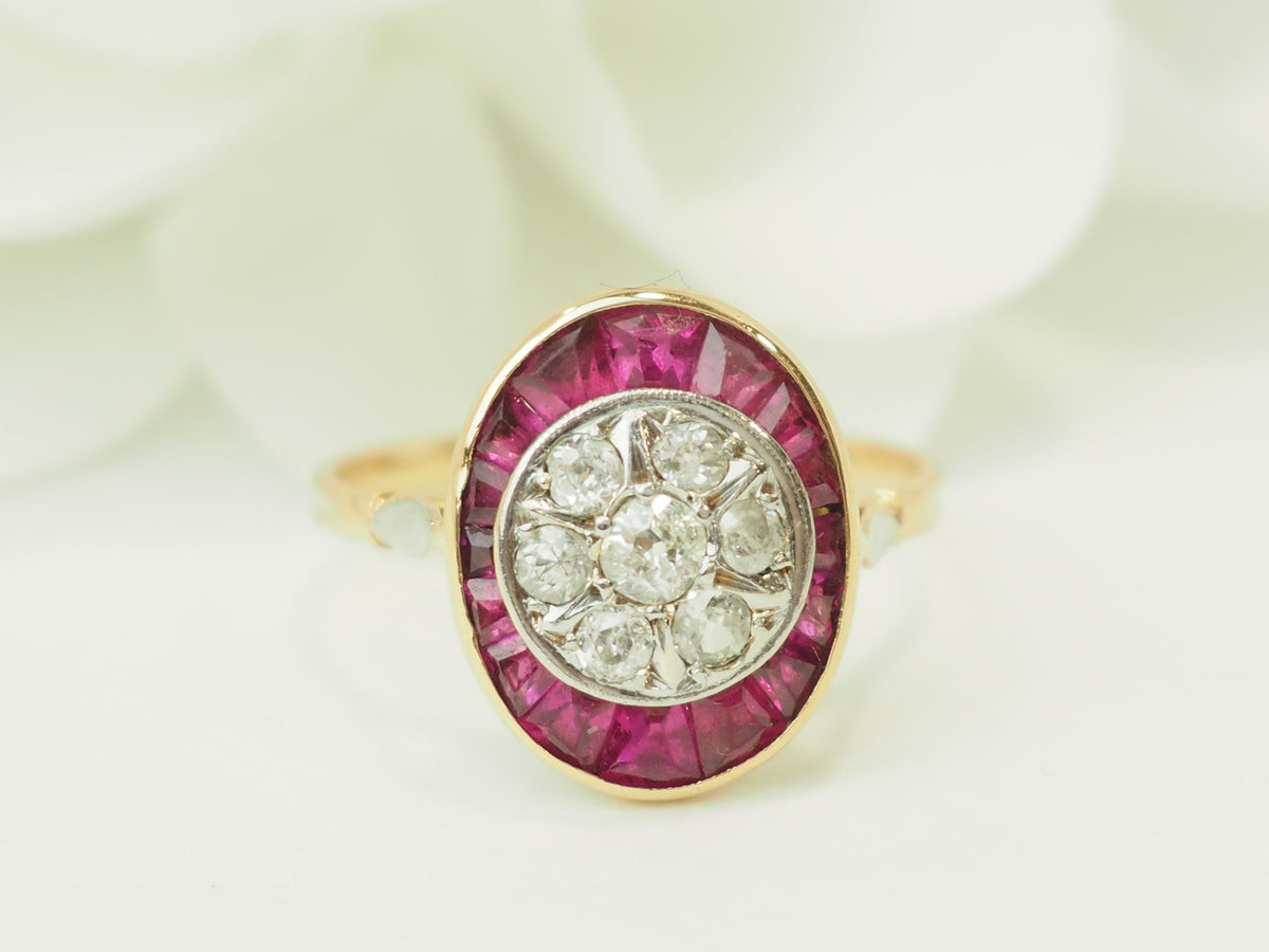 Bague ancienne Art Nouveau L'Aurore en or jaune et platine, sertie de rubis calibrés et diamants taille rose