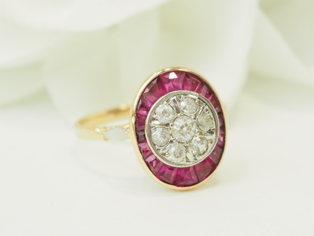 Bague ancienne Art Nouveau L'Aurore en or jaune et platine, sertie de rubis calibrés et diamants taille rose