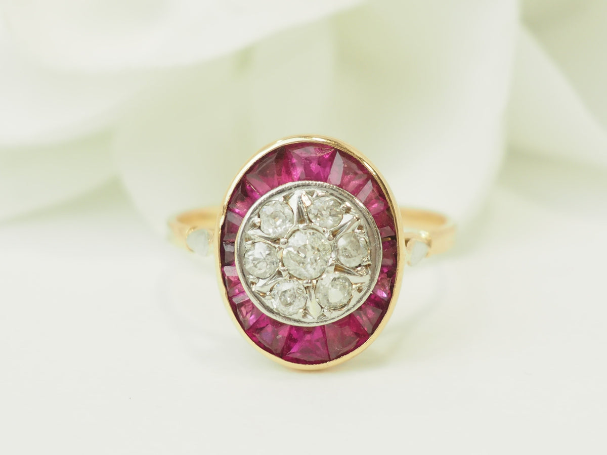 Bague ancienne Art Nouveau L'Aurore en or jaune et platine, sertie de rubis calibrés et diamants taille rose