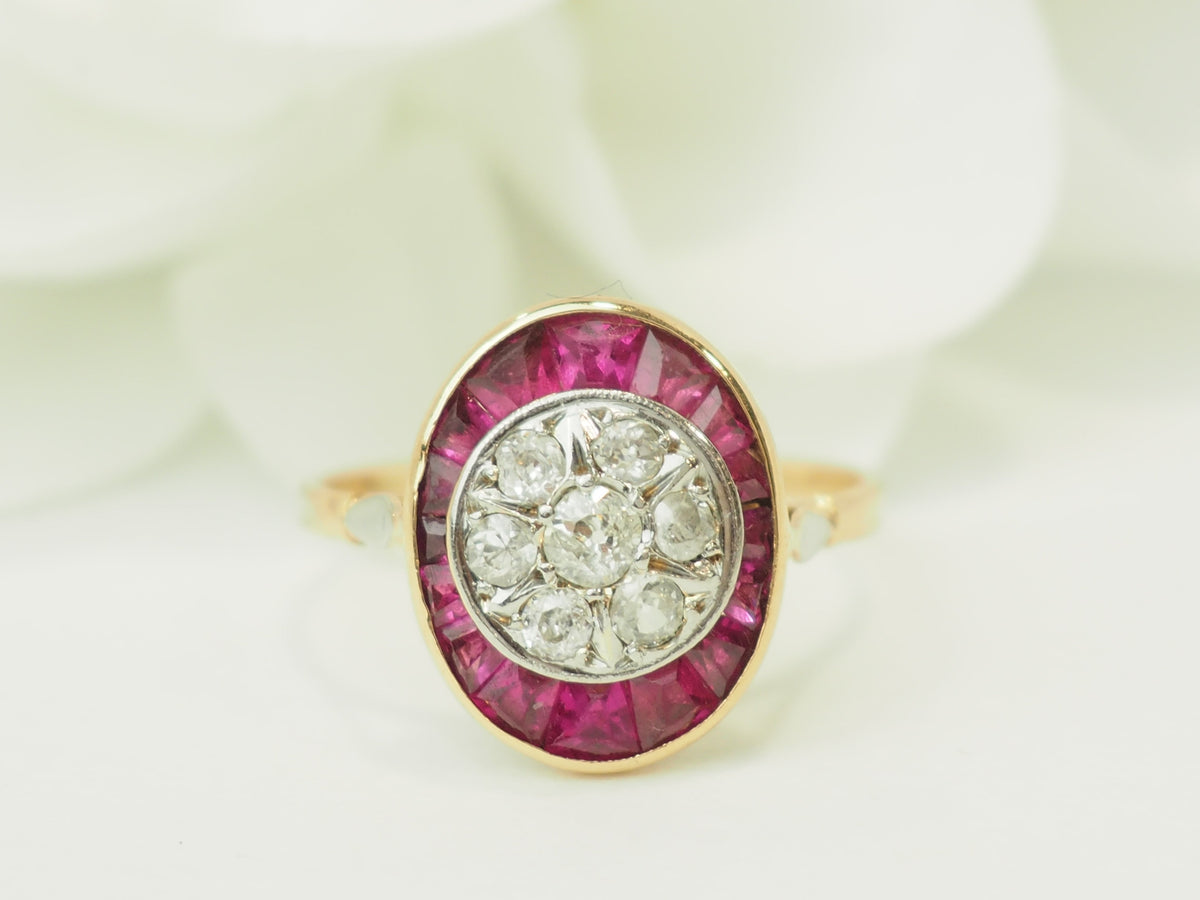 Bague ancienne Art Nouveau L'Aurore en or jaune et platine, sertie de rubis calibrés et diamants taille rose