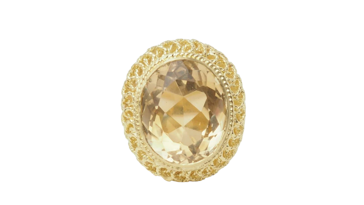 Bague vintage L'Aurore en or jaune 18 carats avec une grande citrine facettée ovale et détails en filigrane