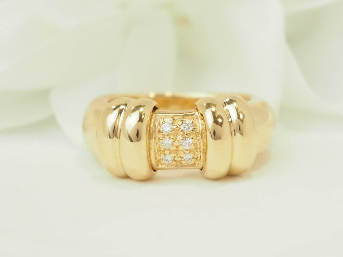 Bague vintage L'Aurore en or jaune 18 carats avec un centre coulissant orné de petits diamants brillants