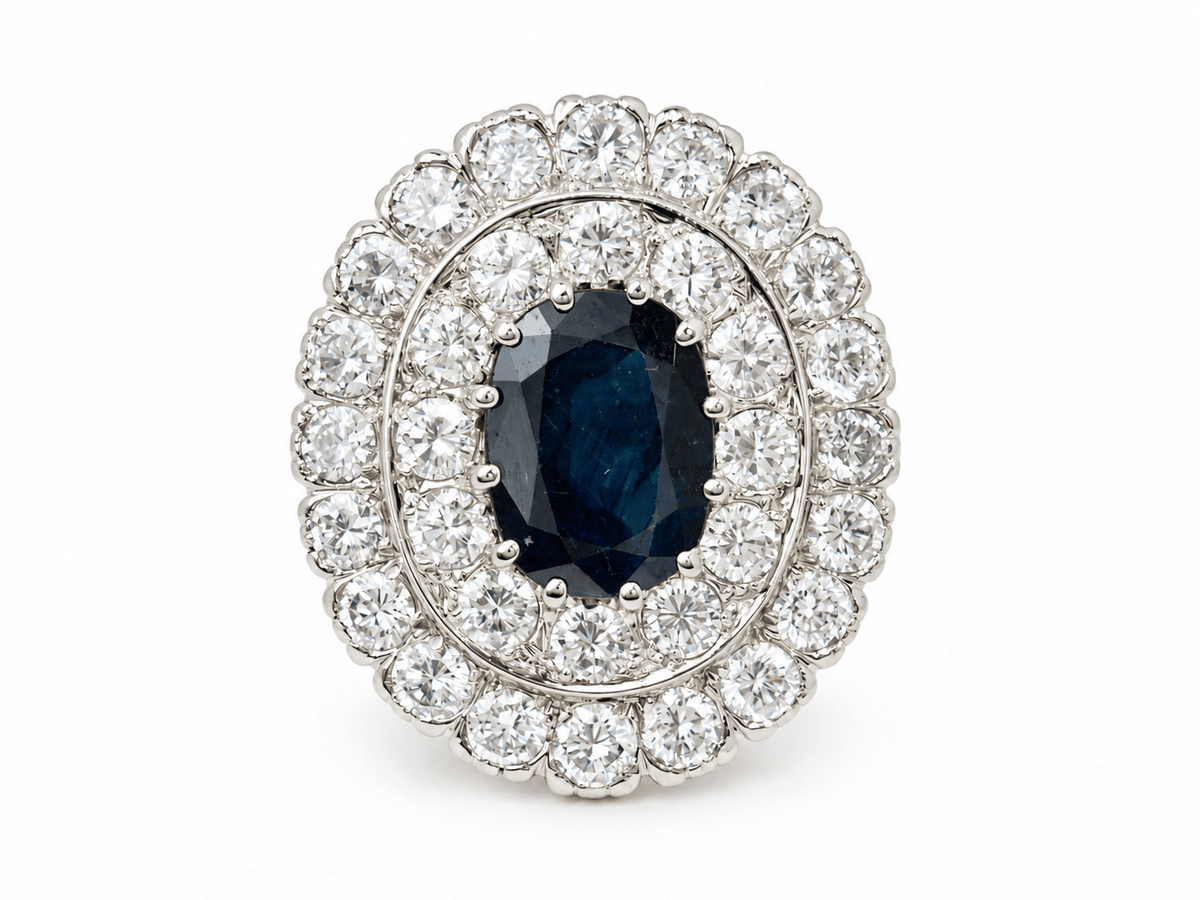 Bague pompadour L'Aurore en or avec saphir bleu-vert ovale de 5,10ct et double entourage de 32 diamants