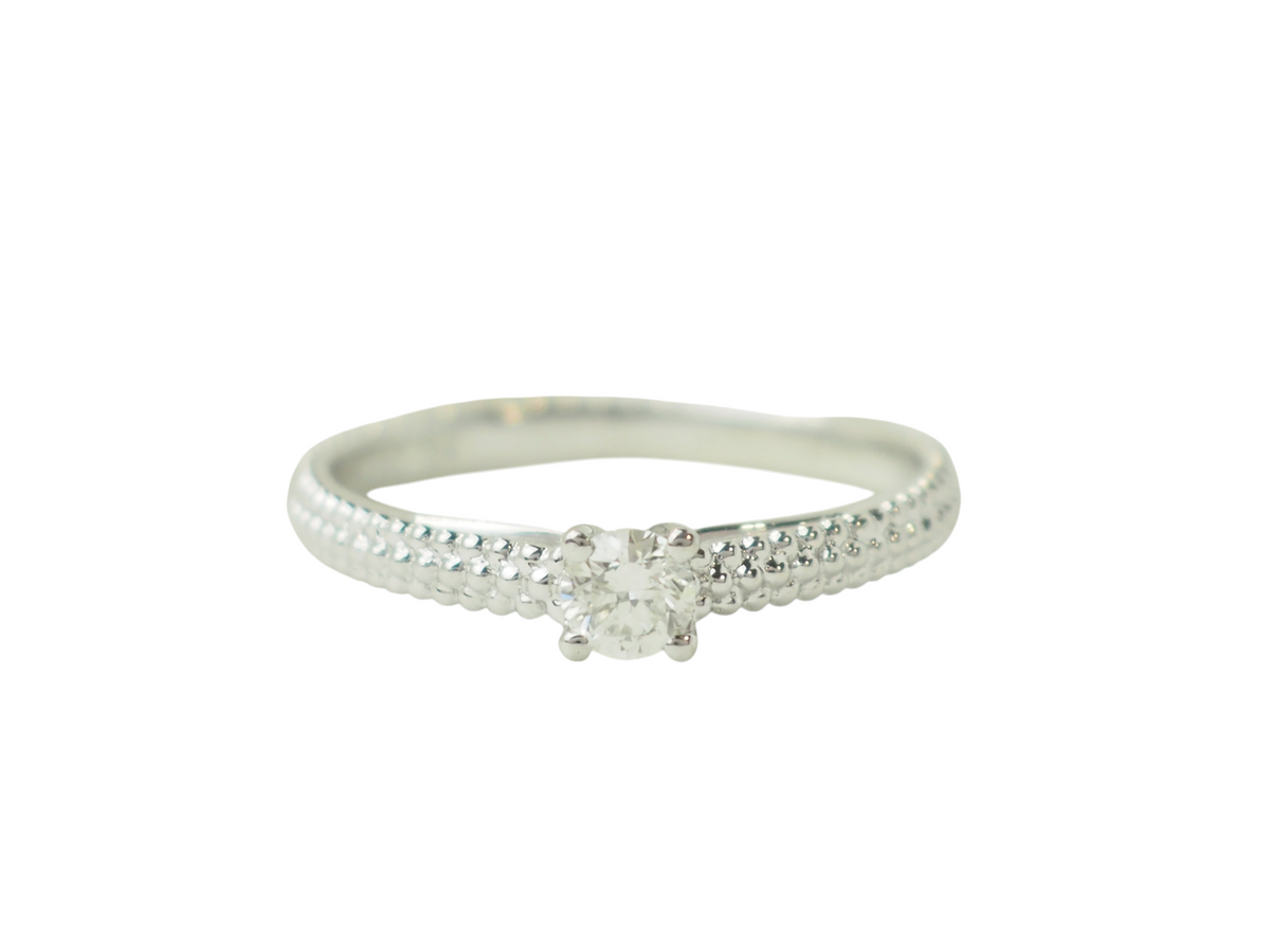 Bague solitaire Mauboussin Fan du premier jour en or blanc 18 carats avec diamant central, vendue par L'Aurore