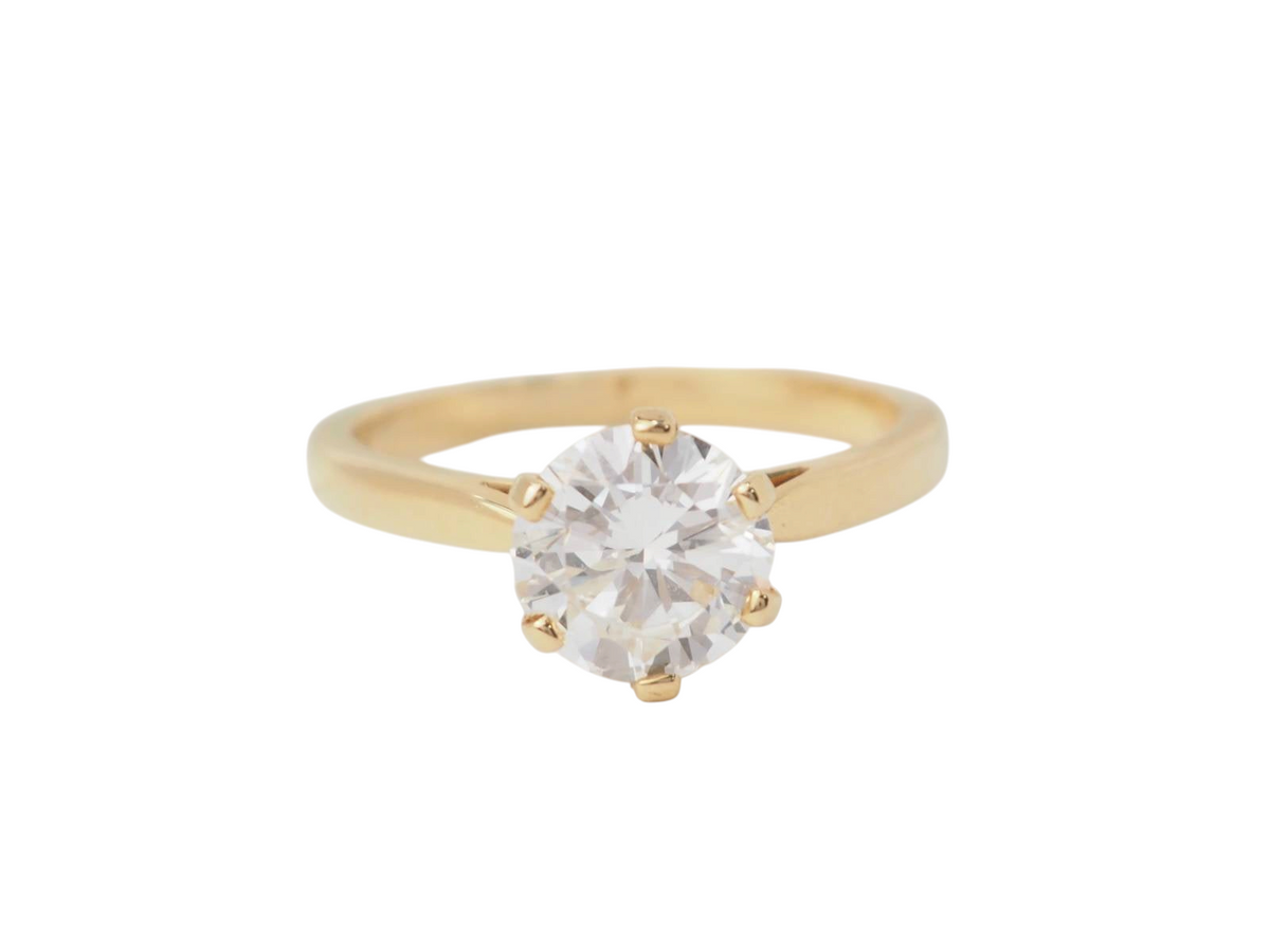 Bague solitaire L'Aurore en or jaune 18 carats sertie d'un diamant taille brillant de 1,59 carat à six griffes