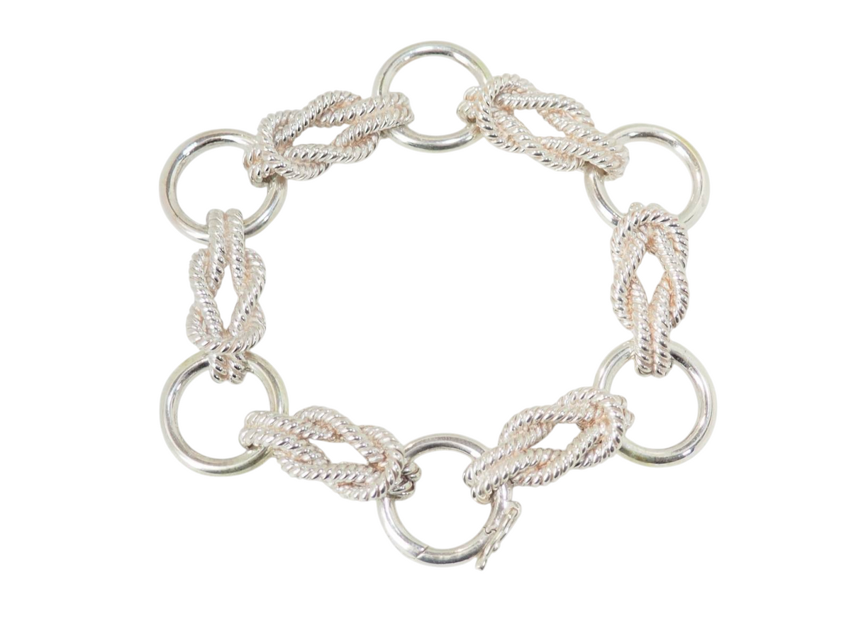 Bracelet L'Aurore Hermès Audierne en argent massif avec maillons circulaires et nœuds marins torsadés