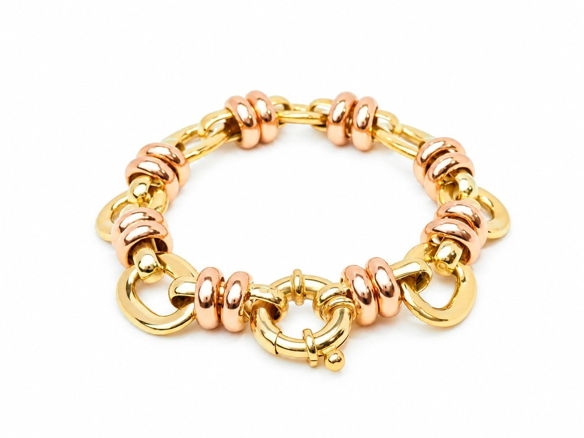 Bracelet L'Aurore pour femme en or jaune et or rose avec maillons circulaires polis et fermoir sécurisé